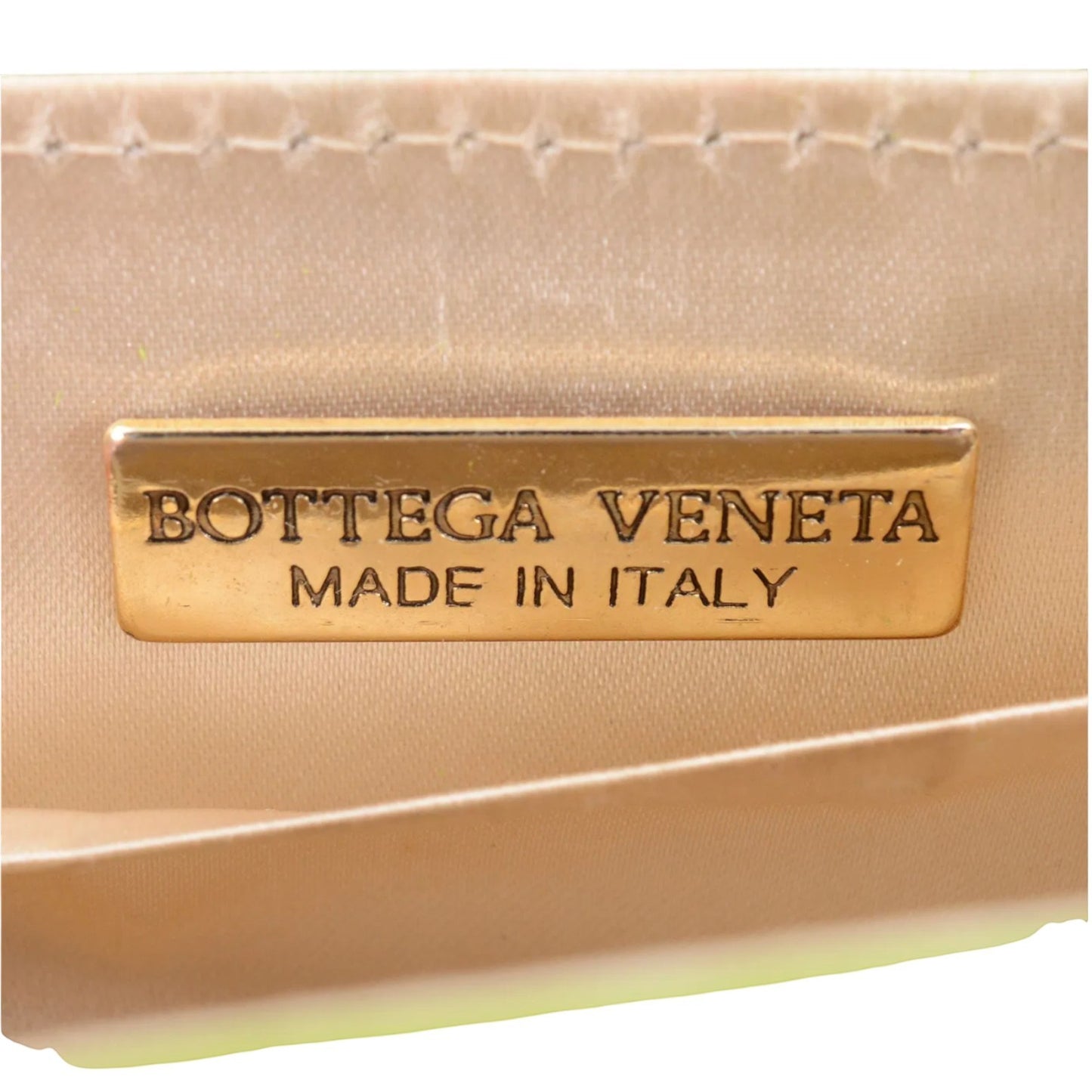 Cookie Monster Vintage Bottega Veneta lime green intrecciato mini bag with gold-tone hardware.