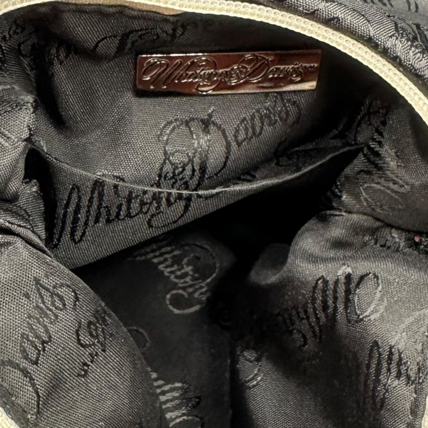 Whiting and Davis camo mesh fringe bag, clasp close-up