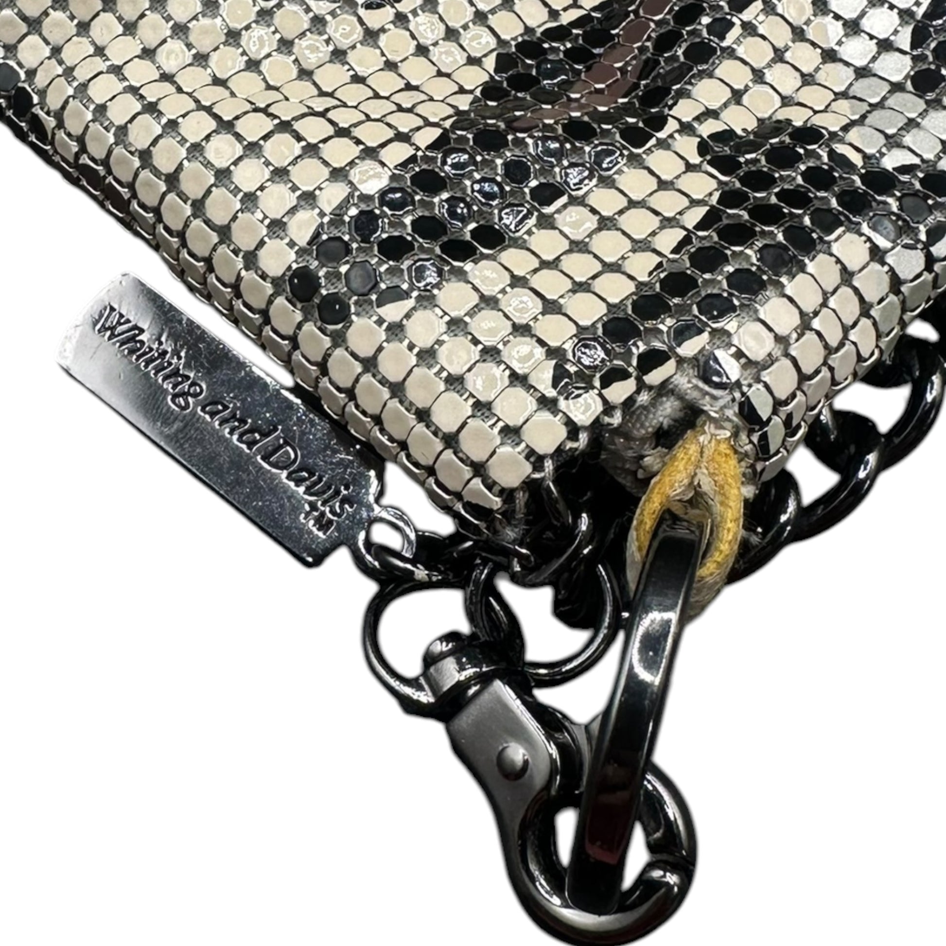 Whiting and Davis camo mesh fringe bag, label close-up