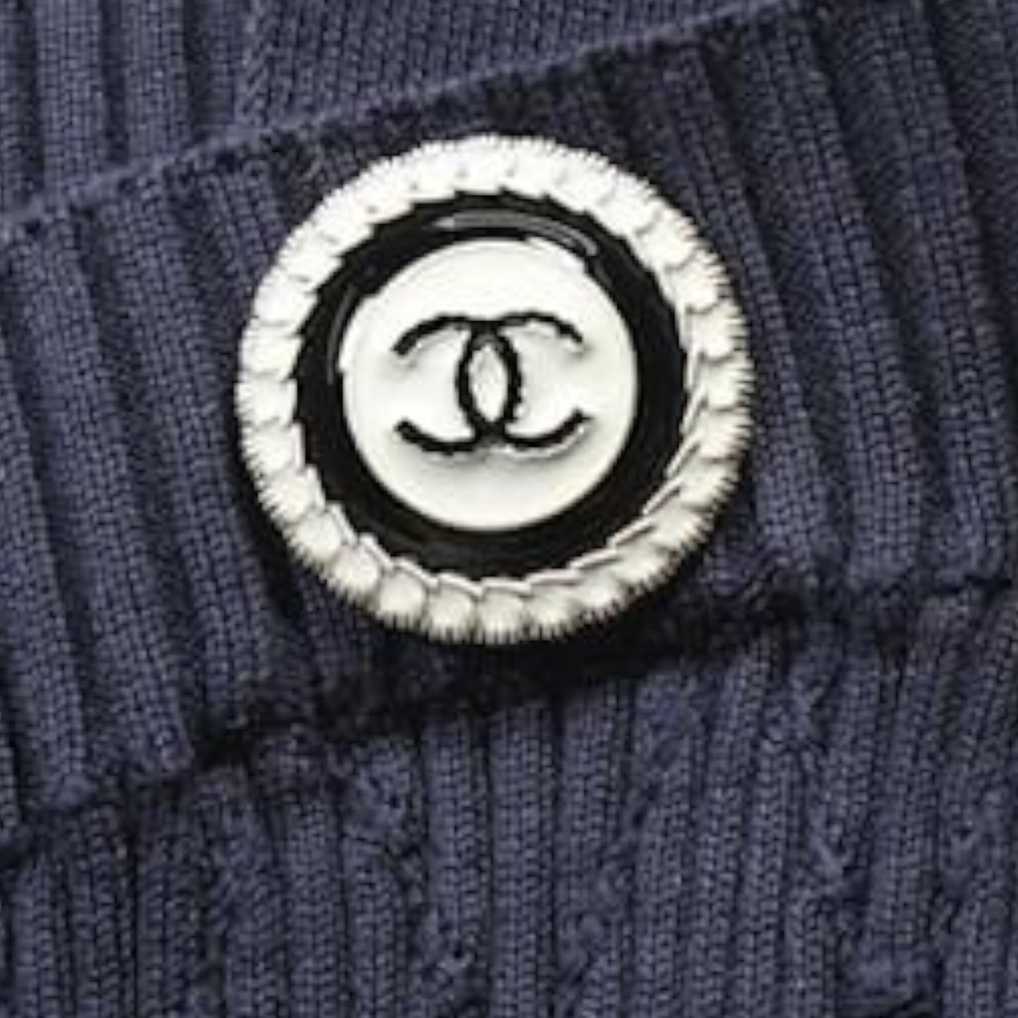Chanel navy and white ribbed knit top, side view