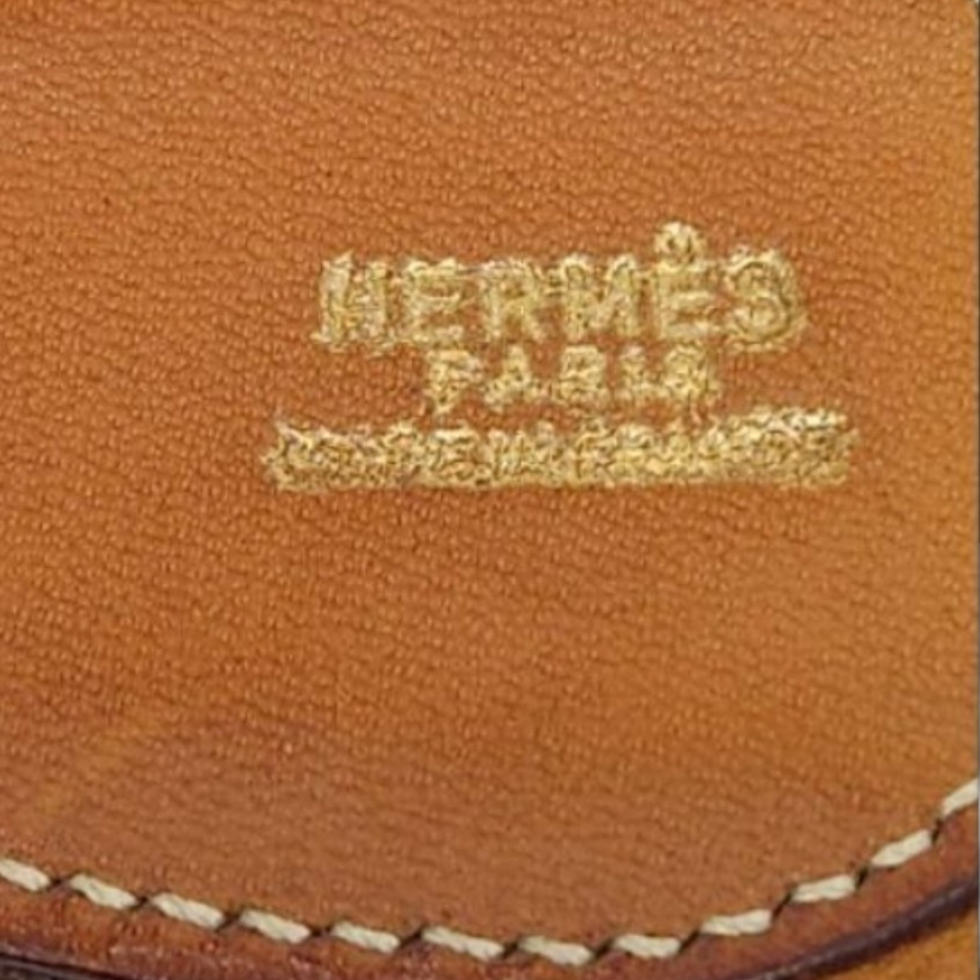 Hermès equestrian leather canvas belt, three-quarter view