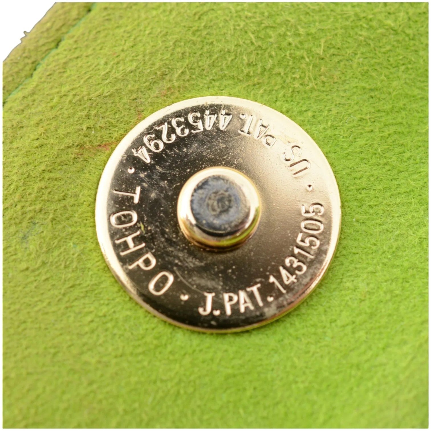 Cookie Monster Vintage Bottega Veneta lime green mini bag detail of gold-tone magnetic snap closure with patent numbers.